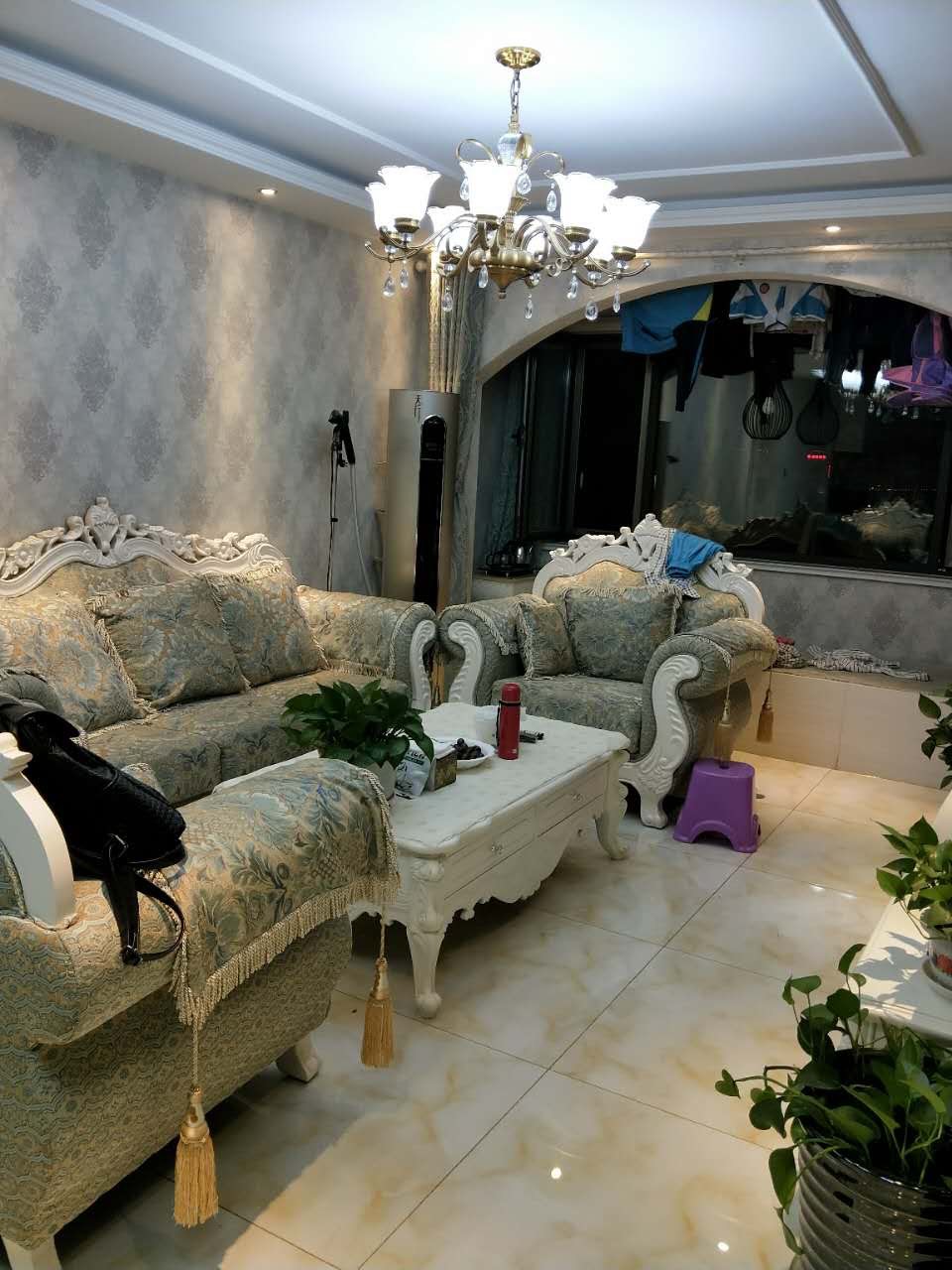 Sala de estar en una casa de familia en Chengde